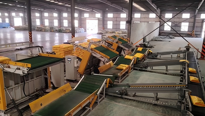 Máy dỡ pallet băng tải nghiêng tự động